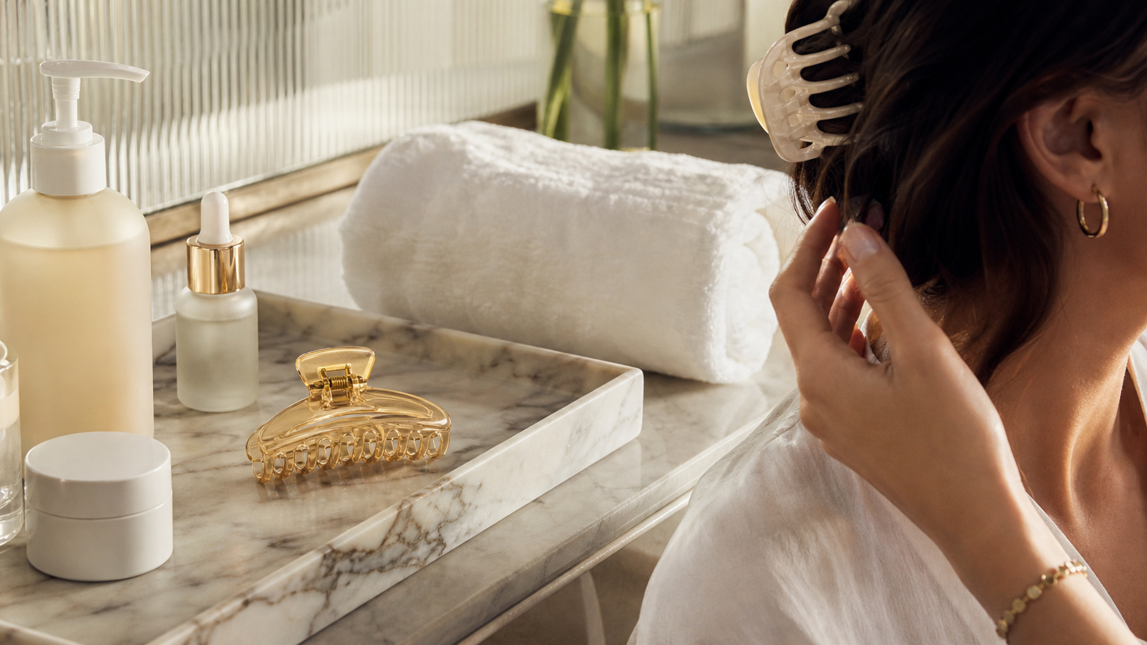 Editorial beauty scene for The Hair Clip That Made My Skincare Routine Feel More Expensive.